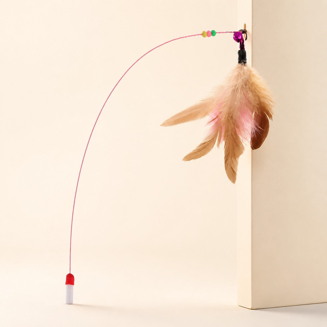 Jouet suspendu Pompon Grelot — photographie studio PawStars